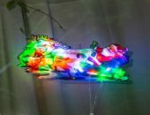Figurina luminoasa ren cu sanie, multicolor